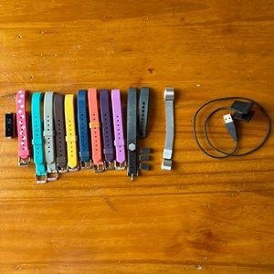 Fitbit Alta HR (heart rate tracker) -standard sz. With 11 interchangeable bands.